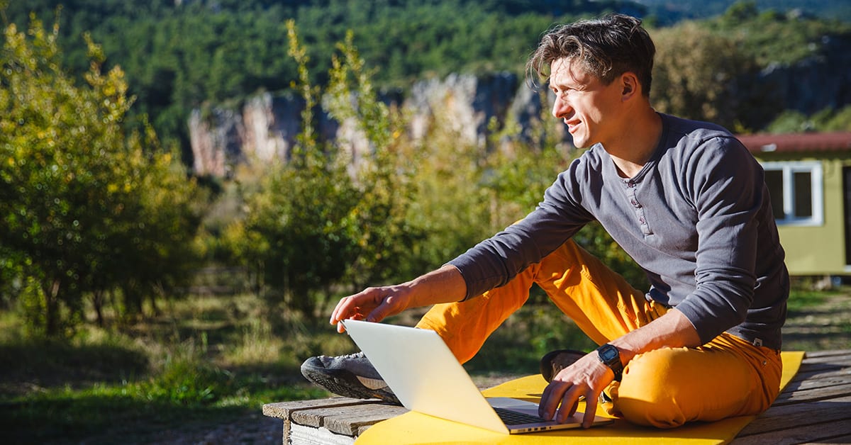 A man who is taking advantage of the top five remote working hacks.