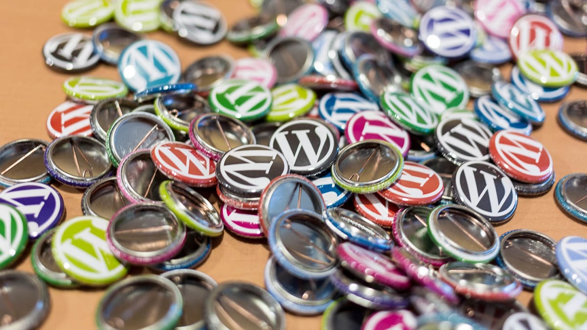 WordPress pins on a table.