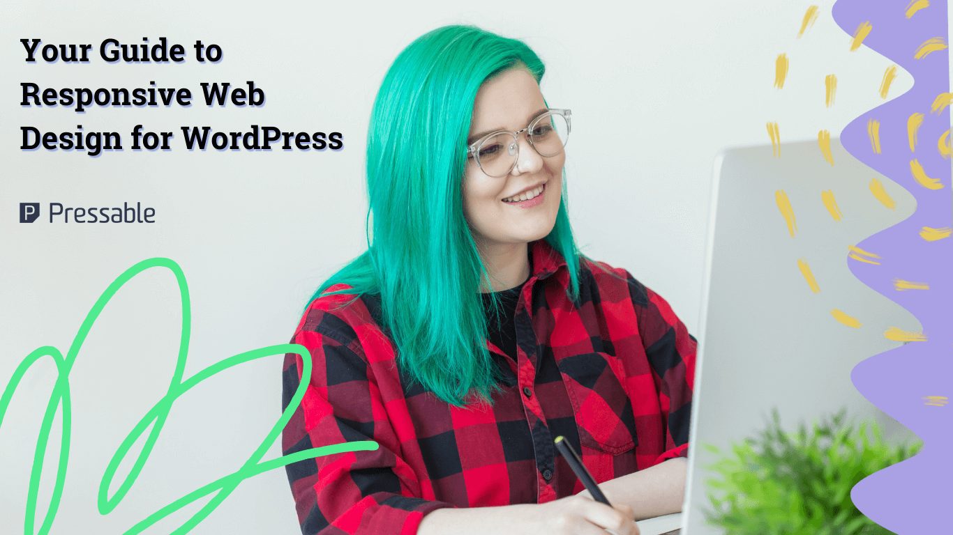 Woman with green hair wearing checkered polo with glasses facing computer